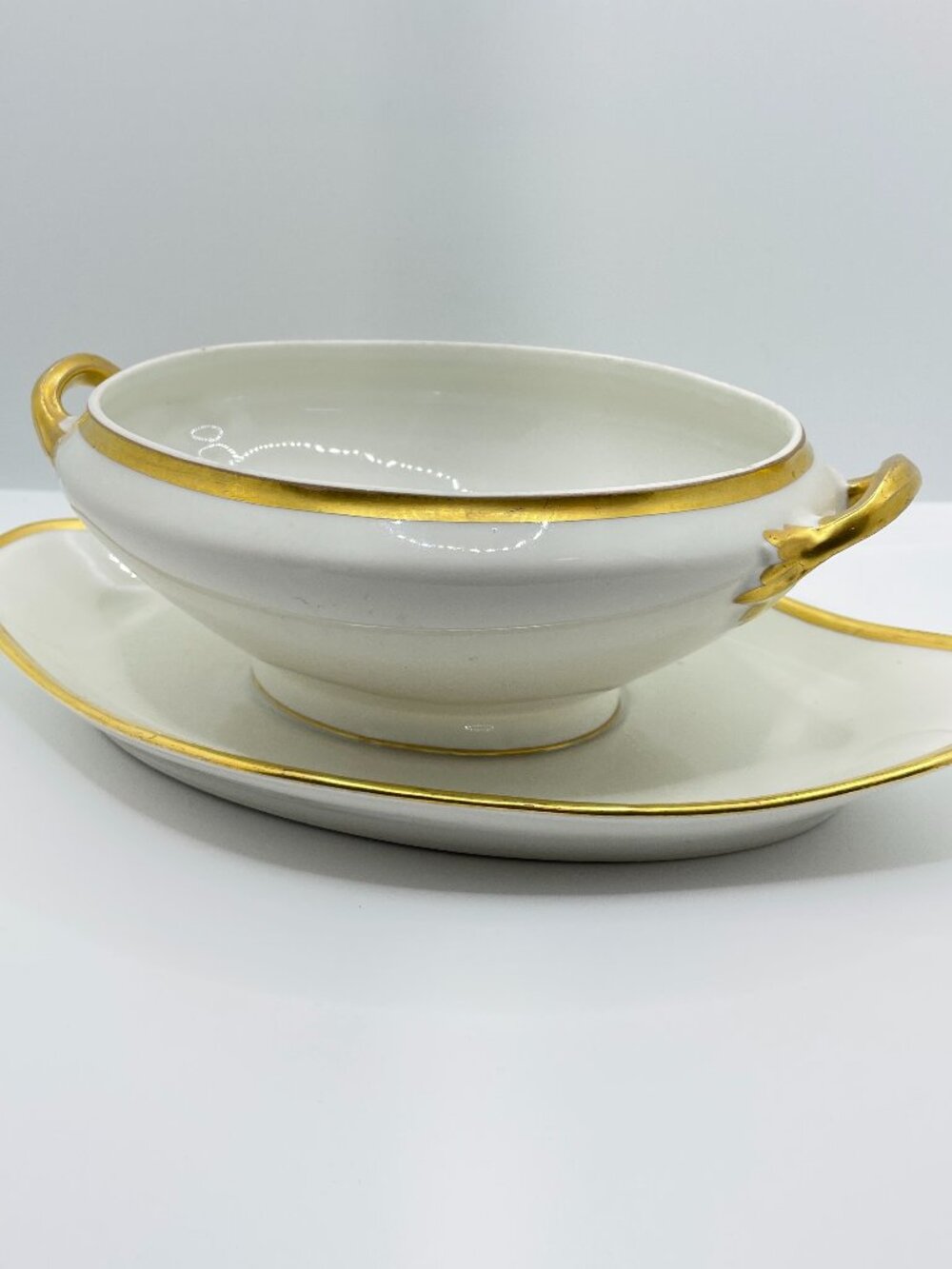 Antique Limoges Bernardaud gravy boat w/affixed base ivory/gold trim